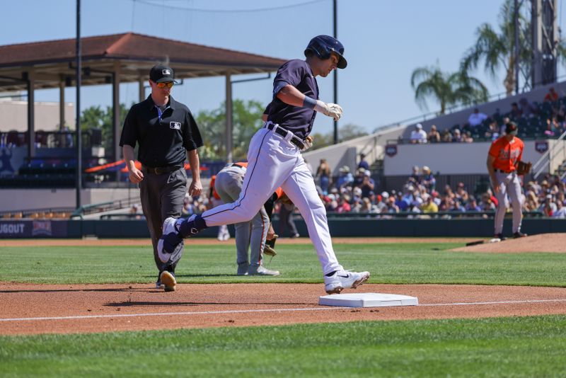 Feb 26, 2023; Lakeland, Florida, USA; Detroit Tigers right fielder Nick Maton (9) rounds third base after hitting a home run against the Baltimore Orioles at Publix Field at Joker Marchant Stadium. Mandatory Credit: Mike Watters-USA TODAY Sports