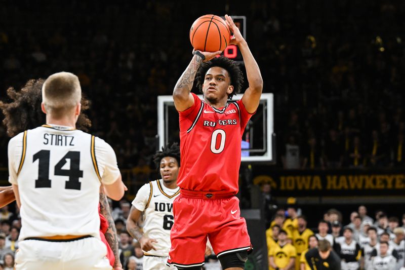 Jan 20, 2026; Iowa City, Iowa, USA; Rutgers Scarlet Knights guard Tariq Francis (0) shoots the ball against the Iowa Hawkeyes during the first half at Carver-Hawkeye Arena. Mandatory Credit: Jeffrey Becker-Imagn Images