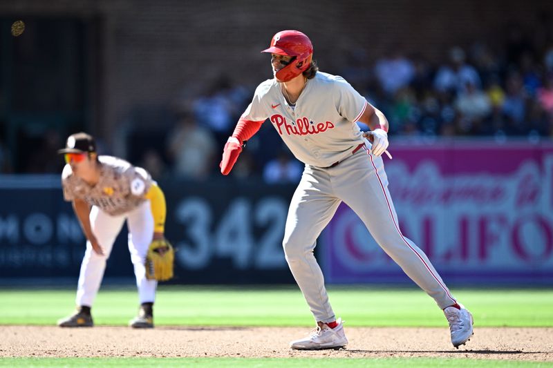 Apr 28, 2024; San Diego, California, USA; Philadelphia Phillies third baseman Alec Bohm (28) leads off second base during the ninth inning against the San Diego Padres at Petco Park. Mandatory Credit: Orlando Ramirez-USA TODAY Sports