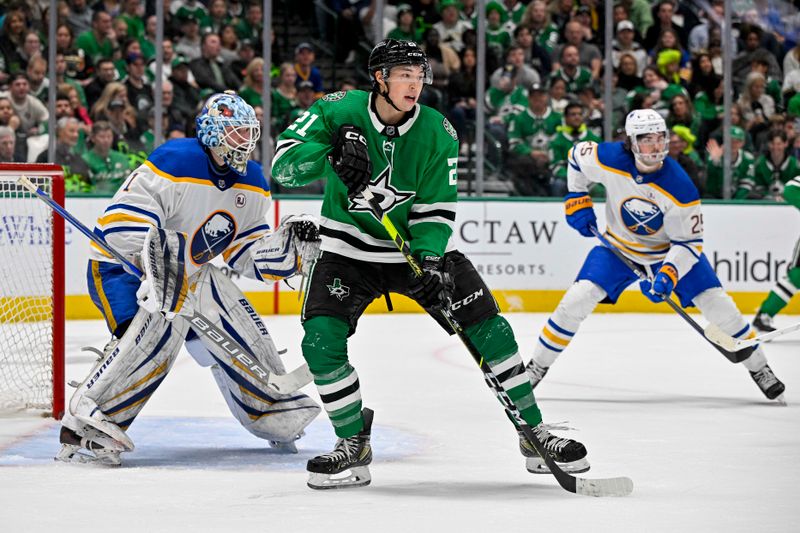 Apr 9, 2024; Dallas, Texas, USA; Dallas Stars left wing Jason Robertson (21) looks for the puck in front of Buffalo Sabres goaltender Ukko-Pekka Luukkonen (1) during the second period at the American Airlines Center. Mandatory Credit: Jerome Miron-USA TODAY Sports