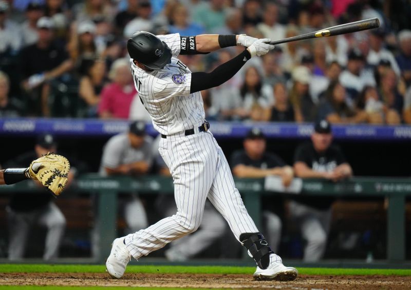 Jul 14, 2023; Denver, Colorado, USA; Colorado Rockies right fielder Kris Bryant (23) hits a two run home run in the seventh inning against the New York Yankees at Coors Field. Mandatory Credit: Ron Chenoy-USA TODAY Sports