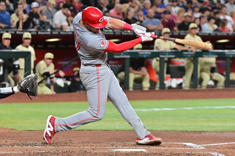 May 14, 2024; Phoenix, Arizona, USA;  Cincinnati Reds catcher Tyler Stephenson (37) doubles in the fourth inning against the Arizona Diamondbacks at Chase Field. Mandatory Credit: Matt Kartozian-USA TODAY Sports