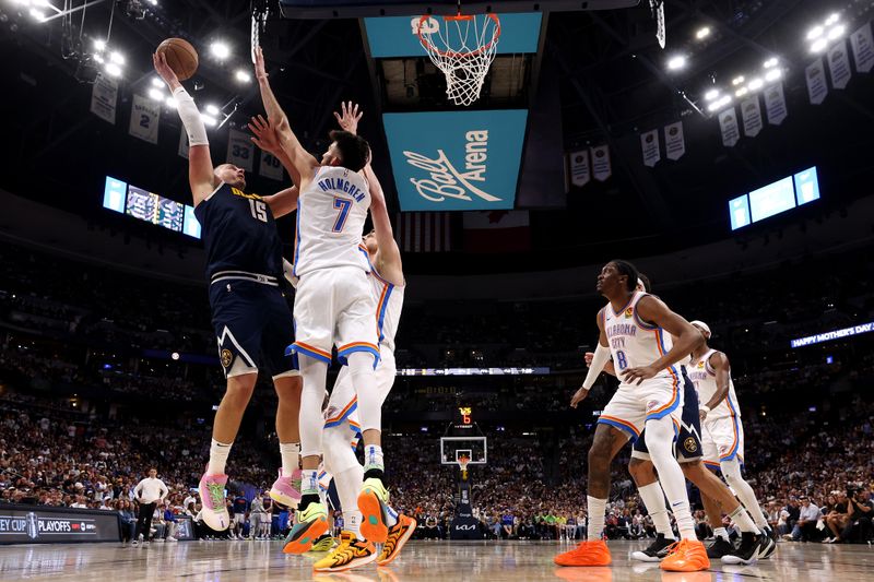 DENVER, COLORADO - MAY 11: Nikola Jokic #15 of the Denver Nuggets shoots the ball against the Oklahoma City Thunder during the second half in Game Four of the Western Conference Second Round NBA Playoffs at Ball Arena on May 11, 2025 in Denver, Colorado. NOTE TO USER: User expressly acknowledges and agrees that, by downloading and or using this photograph, User is consenting to the terms and conditions of the Getty Images License Agreement. (Photo by Matthew Stockman/Getty Images)