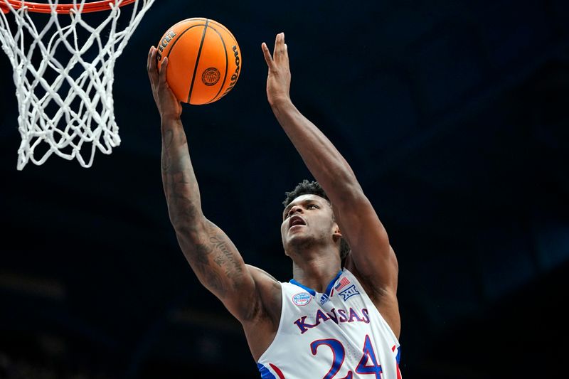  Nov 6, 2023; Lawrence, Kansas, USA; Kansas Jayhawks forward K.J. Adams Jr. (24) shoots a layup during the first half against the North Carolina Central Eagles at Allen Fieldhouse. Mandatory Credit: Jay Biggerstaff-USA TODAY Sports