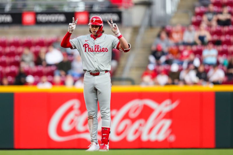 Apr 22, 2024; Cincinnati, Ohio, USA; Philadelphia Phillies third baseman Alec Bohm (28) reacts after hitting a double against the Cincinnati Reds in the fourth inning at Great American Ball Park. Mandatory Credit: Katie Stratman-USA TODAY Sports