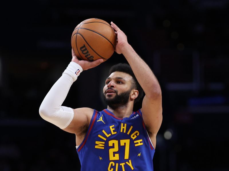 WASHINGTON, DC - JANUARY 21: Jamal Murray #27 of the Denver Nuggets in action against the Washington Wizards at Capital One Arena on January 21, 2024 in Washington, DC. NOTE TO USER: User expressly acknowledges and agrees that, by downloading and or using this photograph, User is consenting to the terms and conditions of the Getty Images License Agreement. (Photo by Patrick Smith/Getty Images)