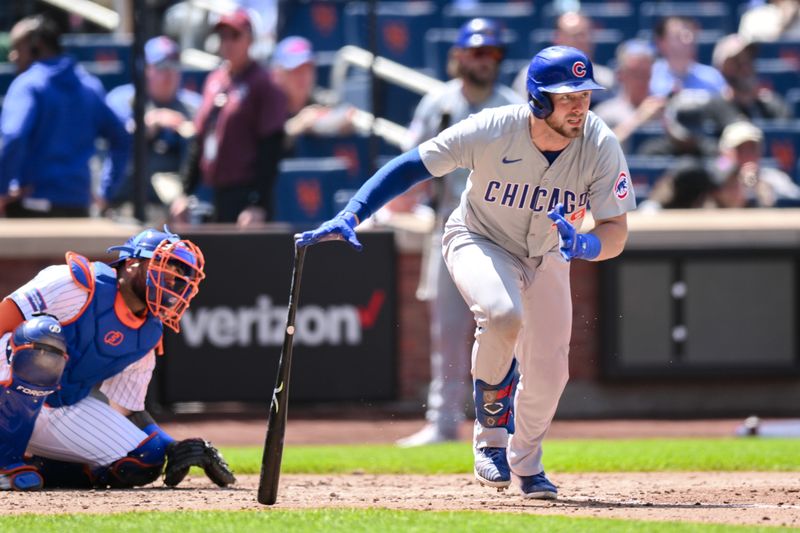 May 2, 2024; New York City, New York, USA; Chicago Cubs first baseman Michael Busch (29) hits a single against the New York Mets during the fourth inning at Citi Field. Mandatory Credit: John Jones-USA TODAY Sports