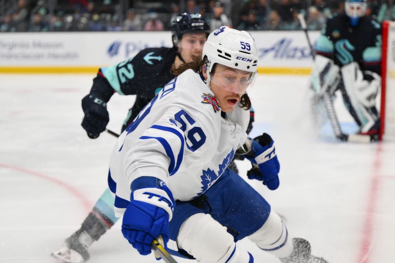 Jan 21, 2024; Seattle, Washington, USA; Toronto Maple Leafs left wing Tyler Bertuzzi (59) plays the puck during the third period against the Seattle Kraken at Climate Pledge Arena. Mandatory Credit: Steven Bisig-USA TODAY Sports