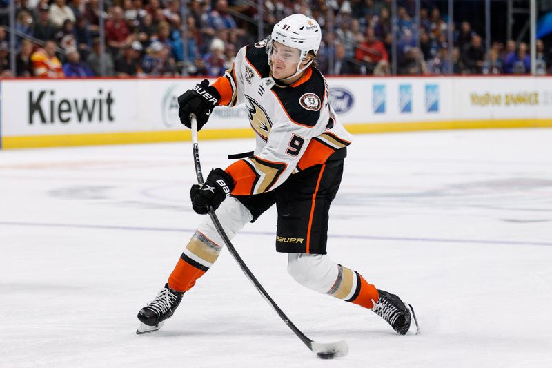 Dec 5, 2023; Denver, Colorado, USA; Anaheim Ducks center Leo Carlsson (91) takes a shot in the third period against the Colorado Avalanche at Ball Arena. Mandatory Credit: Isaiah J. Downing-USA TODAY Sports