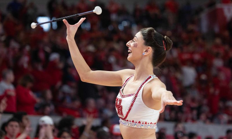 Jan 28, 2023; Houston, Texas, USA; A Houston Cougars band member twirls a baton during a Cincinnati Bearcats timeout in the second half at Fertitta Center. Houston Cougars won 75 to 69 .Mandatory Credit: Thomas Shea-USA TODAY Sports