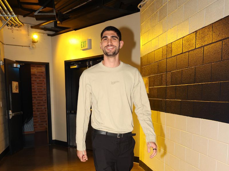 MEMPHIS, TN - MARCH 16:  Santi Aldama #7 of the Memphis Grizzlies arrives to the arena before the game against the Oklahoma City Thunder on March 16, 2024 at FedExForum in Memphis, Tennessee. NOTE TO USER: User expressly acknowledges and agrees that, by downloading and or using this photograph, User is consenting to the terms and conditions of the Getty Images License Agreement. Mandatory Copyright Notice: Copyright 2024 NBAE (Photo by Joe Murphy/NBAE via Getty Images)