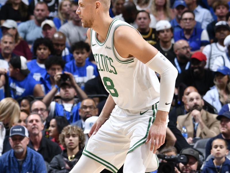 ORLANDO, FL - APRIL 27:  Kristaps Porzingis #8 of the Boston Celtics  looks on during the game against the Orlando Magic during Round 1 Game 4 of the 2025 NBA Playoffs on April 27, 2025 at Kia Center in Orlando, Florida. NOTE TO USER: User expressly acknowledges and agrees that, by downloading and or using this photograph, User is consenting to the terms and conditions of the Getty Images License Agreement. Mandatory Copyright Notice: Copyright 2025 NBAE (Photo by Fernando Medina/NBAE via Getty Images)