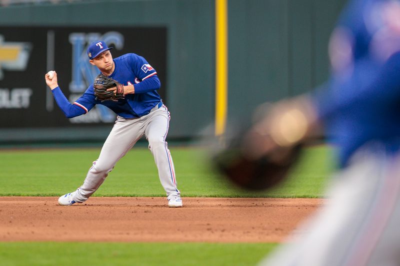 May 4, 2024; Kansas City, Missouri, USA; Texas Rangers shortstop Corey Seager (5) throws to second base during the fifth inning against the Kansas City Royals at Kauffman Stadium. Mandatory Credit: William Purnell-USA TODAY Sports