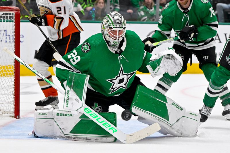 Jan 25, 2024; Dallas, Texas, USA; Dallas Stars goaltender Jake Oettinger (29) stops a shot by the Anaheim Ducks during the third period at the American Airlines Center. Mandatory Credit: Jerome Miron-USA TODAY Sports