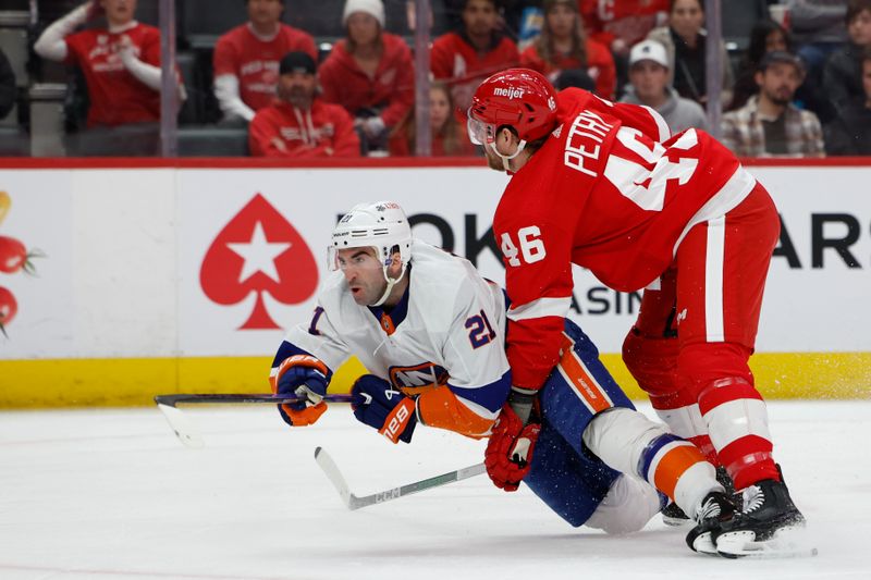 Feb 29, 2024; Detroit, Michigan, USA;  New York Islanders center Brock Nelson (29) skates with the puck against Detroit Red Wings defenseman Jeff Petry (46) in the first period at Little Caesars Arena. Mandatory Credit: Rick Osentoski-USA TODAY Sports