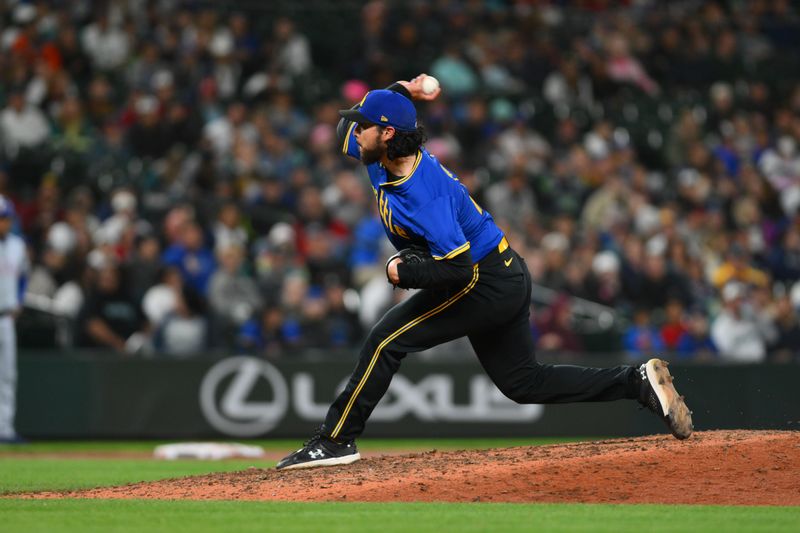 Sep 14, 2024; Seattle, Washington, USA; Seattle Mariners relief pitcher Andres Munoz (75) pitches to the Texas Rangers during the ninth inning at T-Mobile Park. Mandatory Credit: Steven Bisig-Imagn Images