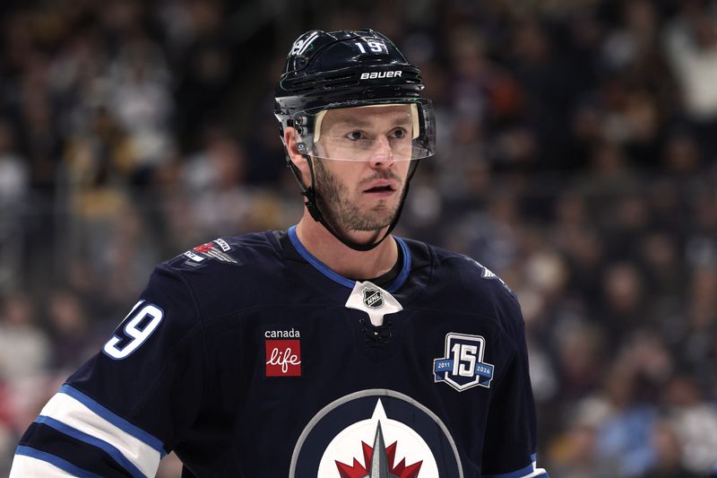 Nov 1, 2025; Winnipeg, Manitoba, CAN; Winnipeg Jets center Jonathan Toews (19) looks on before a face off against the Pittsburgh Penguins in the second period at Canada Life Centre. Mandatory Credit: James Carey Lauder-Imagn Images Nov 1, 2025; Winnipeg, Manitoba, CAN; Winnipeg Jets center Jonathan Toews (19) looks on before a face off against the Pittsburgh Penguins in the second period at Canada Life Centre. Mandatory Credit: James Carey Lauder-Imagn Images