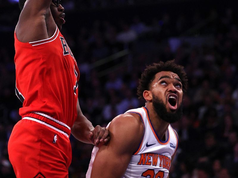 NEW YORK, NEW YORK - NOVEMBER 13: Karl-Anthony Towns #32 of the New York Knicks looks to shoot the ball against Jalen Smith #7 of the Chicago Bulls during the first quarter at Madison Square Garden on November 13, 2024 in New York City. NOTE TO USER: User expressly acknowledges and agrees that, by downloading and or using this photograph, User is consenting to the terms and conditions of the Getty Images License Agreement. (Photo by Elsa/Getty Images)