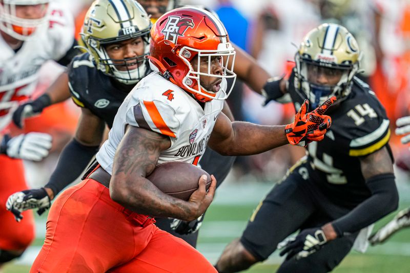 Sep 30, 2023; Atlanta, Georgia, USA; Bowling Green Falcons running back Terion Stewart (4) runs the ball against the Georgia Tech Yellow Jackets during the second half at Hyundai Field. Mandatory Credit: Dale Zanine-USA TODAY Sports