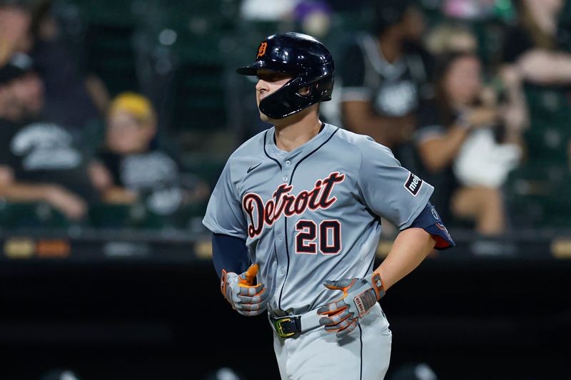 Aug 26, 2024; Chicago, Illinois, USA; Detroit Tigers first baseman Spencer Torkelson (20) rounds the bases after hitting a three-run home run against the Chicago White Sox during the seventh inning at Guaranteed Rate Field. Mandatory Credit: Kamil Krzaczynski-USA TODAY Sports