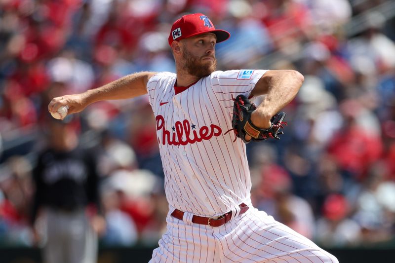 Mar 4, 2025; Clearwater, Florida, USA; Philadelphia Phillies pitcher Zack Wheeler (45) throws a pitch against the New York Yankees in the first inning during spring training at BayCare Ballpark. Mandatory Credit: Nathan Ray Seebeck-Imagn Images