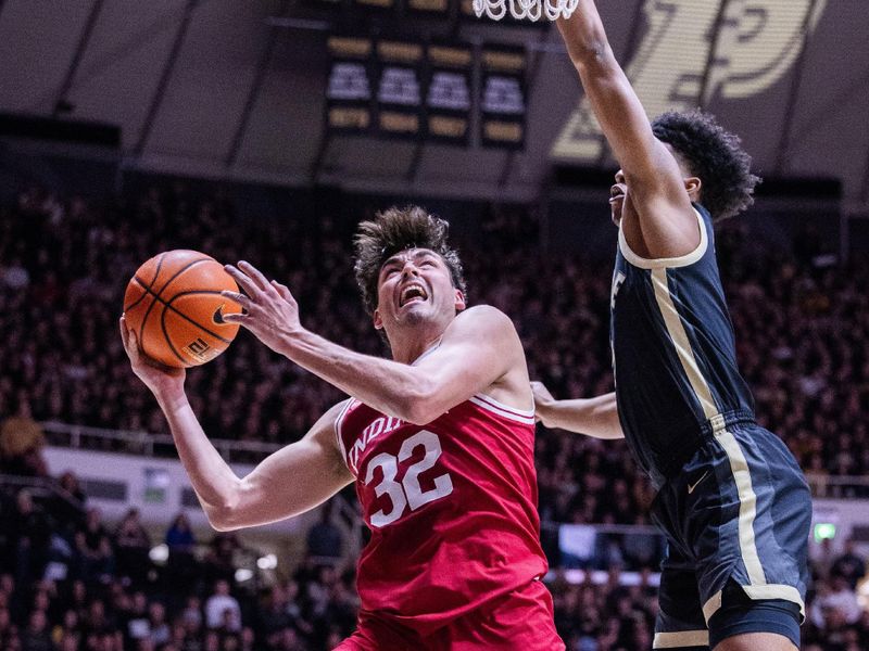 Feb 10, 2024; West Lafayette, Indiana, USA; Indiana Hoosiers guard Trey Galloway (32) shoots the ball while Purdue Boilermakers guard Myles Colvin (5) defends in the first half at Mackey Arena. Mandatory Credit: Trevor Ruszkowski-USA TODAY Sports