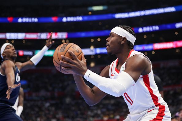 LOS ANGELES, CALIFORNIA - NOVEMBER 17: Aaron Holiday #0 of the Houston Rockets looks to shoot the ball in the second quarter against the Los Angeles Clippers during an NBA In-Season Tournament game at Crypto.com Arena on November 17, 2023 in Los Angeles, California. NOTE TO USER: User expressly acknowledges and agrees that, by downloading and or using this photograph, User is consenting to the terms and conditions of the Getty Images License Agreement. (Photo by Meg Oliphant/Getty Images)