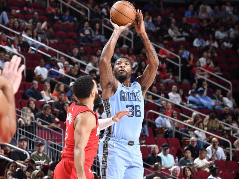 HOUSTON, TX - OCTOBER 25: Marcus Smart #36 of the Memphis Grizzlies shoots the ball during the game against the Houston Rockets on October 25, 2024 at the Toyota Center in Houston, Texas. NOTE TO USER: User expressly acknowledges and agrees that, by downloading and or using this photograph, User is consenting to the terms and conditions of the Getty Images License Agreement. Mandatory Copyright Notice: Copyright 2024 NBAE (Photo by Logan Riely/NBAE via Getty Images)