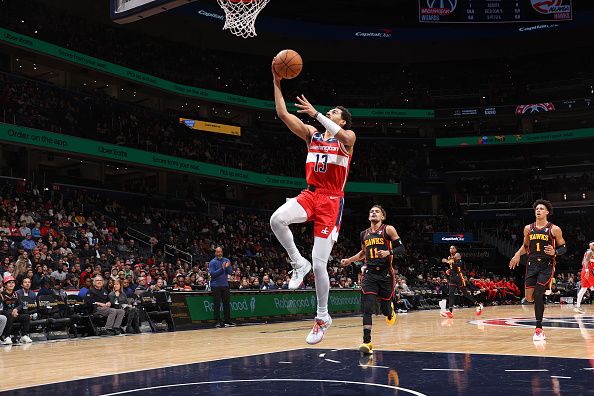 WASHINGTON, DC -? DECEMBER 31: Jordan Poole #13 of the Washington Wizards shoots the ball during the game against the Atlanta Hawks on December 31, 2023 at Capital One Arena in Washington, DC. NOTE TO USER: User expressly acknowledges and agrees that, by downloading and or using this Photograph, user is consenting to the terms and conditions of the Getty Images License Agreement. Mandatory Copyright Notice: Copyright 2023 NBAE (Photo by Stephen Gosling/NBAE via Getty Images)