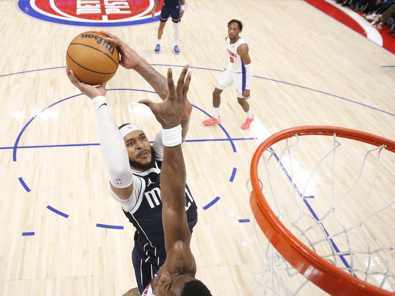 DETROIT, MI - JANUARY 31:  Daniel Gafford #21 of the Dallas Mavericks drives to the basket during the game against the Detroit Pistons on January 31, 2025 at Little Caesars Arena in Detroit, Michigan. NOTE TO USER: User expressly acknowledges and agrees that, by downloading and/or using this photograph, User is consenting to the terms and conditions of the Getty Images License Agreement. Mandatory Copyright Notice: Copyright 2025 NBAE (Photo by Brian Sevald/NBAE via Getty Images)