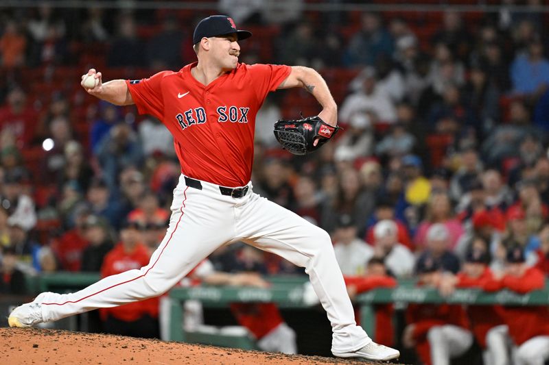 Sep 22, 2024; Boston, MA, USA;  Boston Red Sox pitcher Josh Winckowski (25) pitches against the Minnesota Twins during the eighth inning at Fenway Park. Mandatory Credit: Eric Canha-Imagn Images