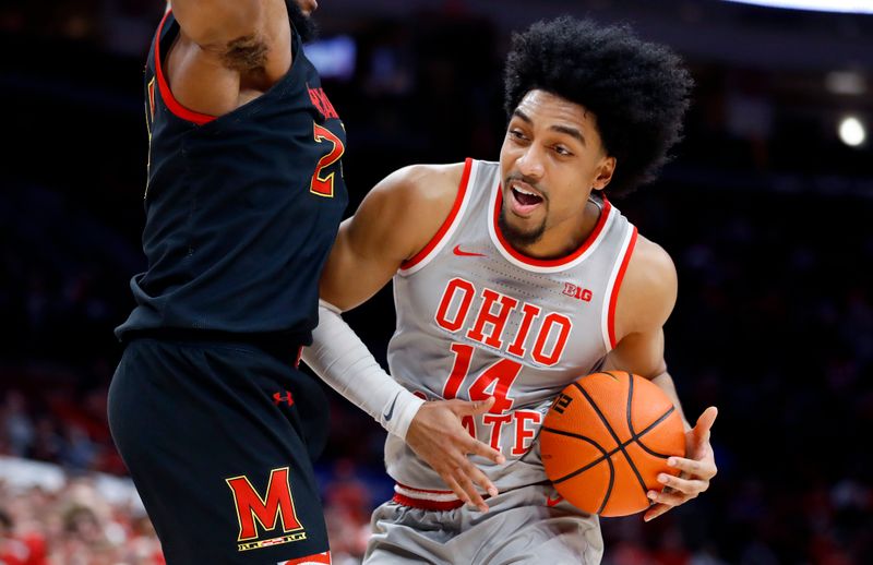 Mar 1, 2023; Columbus, Ohio, USA; Ohio State Buckeyes forward Justice Sueing (14) attempts to shoot the ball against  Maryland Terrapins forward Donta Scott (24)  during the second half at Value City Arena. Mandatory Credit: Joseph Maiorana-USA TODAY Sports