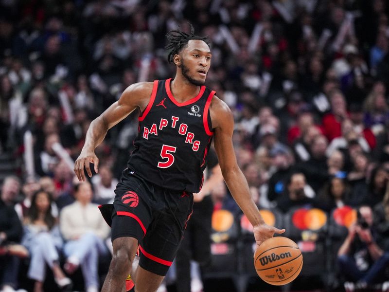 TORONTO, ON - FEBRUARY 9: Immanuel Quickley #5 of the Toronto Raptors dribbles against the Houston Rockets during the first half of their basketball game at the Scotiabank Arena on February 9, 2024 in Toronto, Ontario, Canada. NOTE TO USER: User expressly acknowledges and agrees that, by downloading and/or using this Photograph, user is consenting to the terms and conditions of the Getty Images License Agreement. (Photo by Mark Blinch/Getty Images)