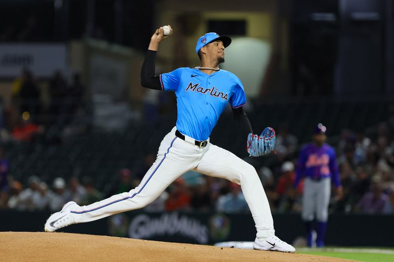 Mar 8, 2024; Jupiter, Florida, USA; Miami Marlins starting pitcher Eury Perez (39) delivers a pitch against the New York Mets during the first inning at Roger Dean Chevrolet Stadium. Mandatory Credit: Sam Navarro-USA TODAY Sports