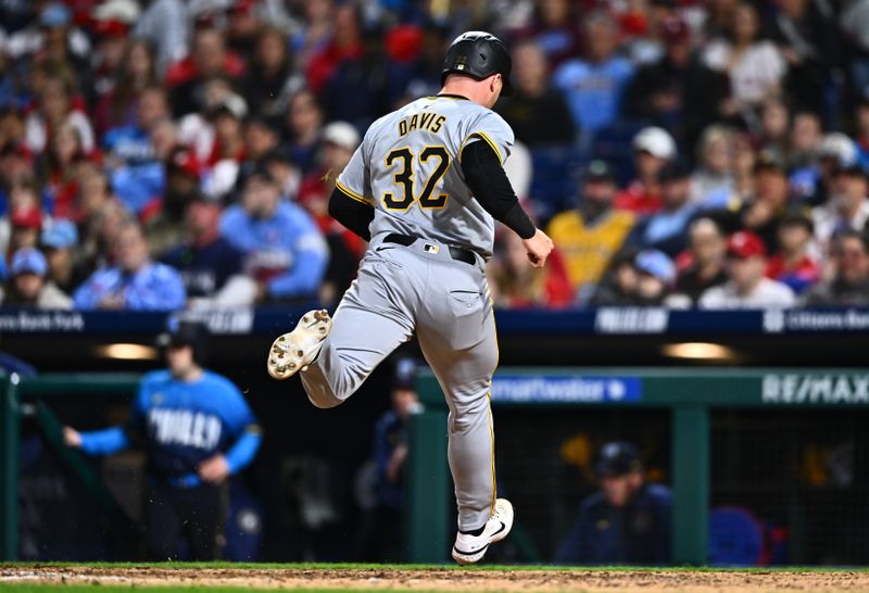 Apr 12, 2024; Philadelphia, Pennsylvania, USA; Pittsburgh Pirates catcher Henry Davis (32) scores a run against the Philadelphia Phillies in the eighth inning at Citizens Bank Park. Mandatory Credit: Kyle Ross-USA TODAY Sports