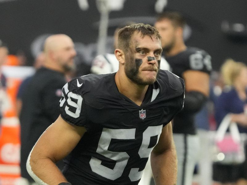 Las Vegas Raiders linebacker Luke Masterson (59) leaves the field after an NFL football game against the Houston Texans, Sunday, Oct 23, 2022, in Las Vegas. (AP Photo/Rick Scuteri)