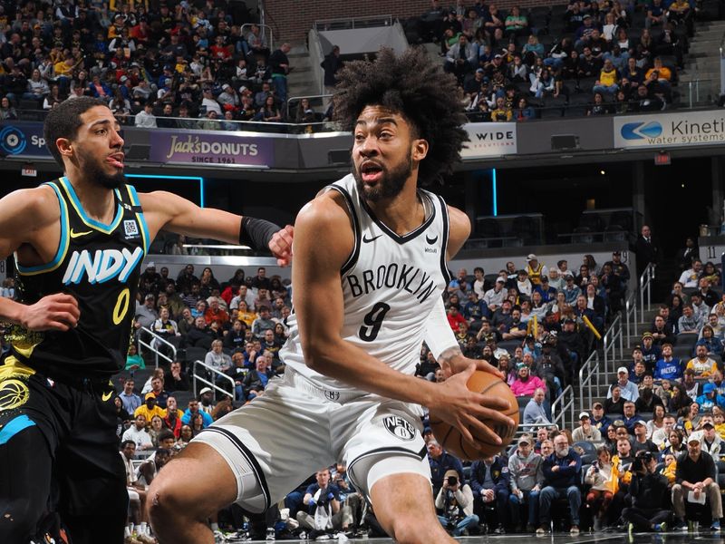 INDIANAPOLIS, IN - MARCH 16: Trendon Watford #9 of the Brooklyn Nets handles the ball during the game against the Indiana Pacers on March 16, 2024 at Gainbridge Fieldhouse in Indianapolis, Indiana. NOTE TO USER: User expressly acknowledges and agrees that, by downloading and or using this Photograph, user is consenting to the terms and conditions of the Getty Images License Agreement. Mandatory Copyright Notice: Copyright 2024 NBAE (Photo by Ron Hoskins/NBAE via Getty Images)