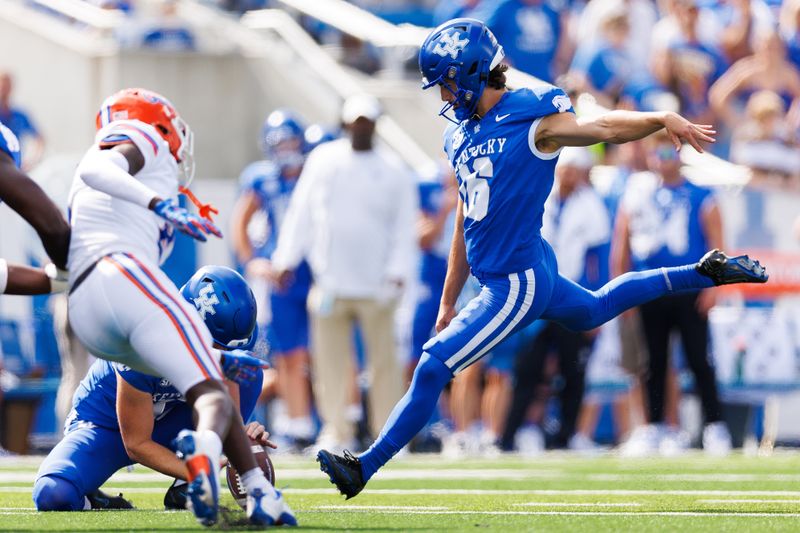 Sep 30, 2023; Lexington, Kentucky, USA; Kentucky Wildcats kicker Alex Raynor (16) kicks a 50 yard field goal during the fourth quarter against the Florida Gators at Kroger Field. Mandatory Credit: Jordan Prather-USA TODAY Sports