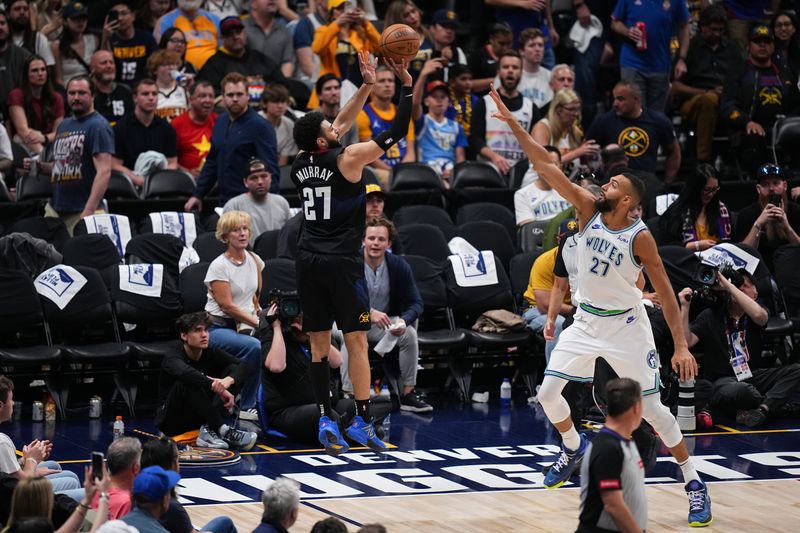 DENVER, CO - MAY 19: Jamal Murray #27 of the Denver Nuggets shoots the ball during the game  against the Minnesota Timberwolves during Round 2 Game 7 of the 2024 NBA Playoffs on May 19, 2024 at the Ball Arena in Denver, Colorado. NOTE TO USER: User expressly acknowledges and agrees that, by downloading and/or using this Photograph, user is consenting to the terms and conditions of the Getty Images License Agreement. Mandatory Copyright Notice: Copyright 2023 NBAE (Photo by Bart Young/NBAE via Getty Images)