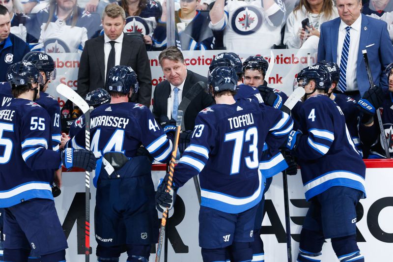 Apr 23, 2024; Winnipeg, Manitoba, CAN; Winnipeg Jets assistant coach Brad Laser talks to the team against the Colorado Avalanche during the third period in game two of the first round of the 2024 Stanley Cup Playoffs at Canada Life Centre. Mandatory Credit: Terrence Lee-USA TODAY Sports