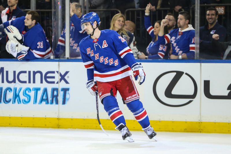 Feb 15, 2024; New York, New York, USA; New York Rangers left wing Chris Kreider (20) circles back to center ice after scoring his third goal in the third period against the Montreal Canadiens at Madison Square Garden. Mandatory Credit: Wendell Cruz-USA TODAY Sports