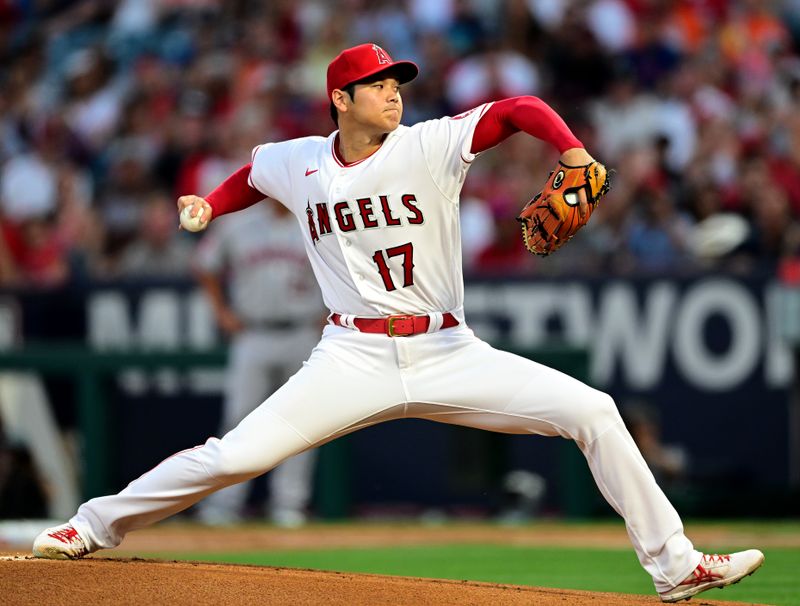 Apr 7, 2022; Anaheim, California, USA; Los Angeles Angels starting pitcher Shohei Ohtani (17) throws a pitch in the first inning against the Houston Astros at Angel Stadium. Mandatory Credit: Jayne Kamin-Oncea-USA TODAY Sports