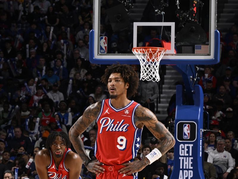 PHILADELPHIA, PA - FEBRUARY 23: Tyrese Maxey #0 and Kelly Oubre Jr. #9 of the Philadelphia 76ers look on during the game against the Cleveland Cavaliers on February 23, 2024 at the Wells Fargo Center in Philadelphia, Pennsylvania NOTE TO USER: User expressly acknowledges and agrees that, by downloading and/or using this Photograph, user is consenting to the terms and conditions of the Getty Images License Agreement. Mandatory Copyright Notice: Copyright 2024 NBAE (Photo by David Dow/NBAE via Getty Images)