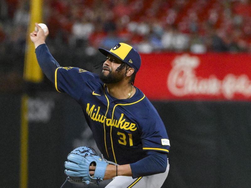 Sep 19, 2025; St. Louis, Missouri, USA;  Milwaukee Brewers relief pitcher Joel Payamps (31) pitches against the St. Louis Cardinals during the fifth inning at Busch Stadium. Mandatory Credit: Jeff Curry-Imagn Images