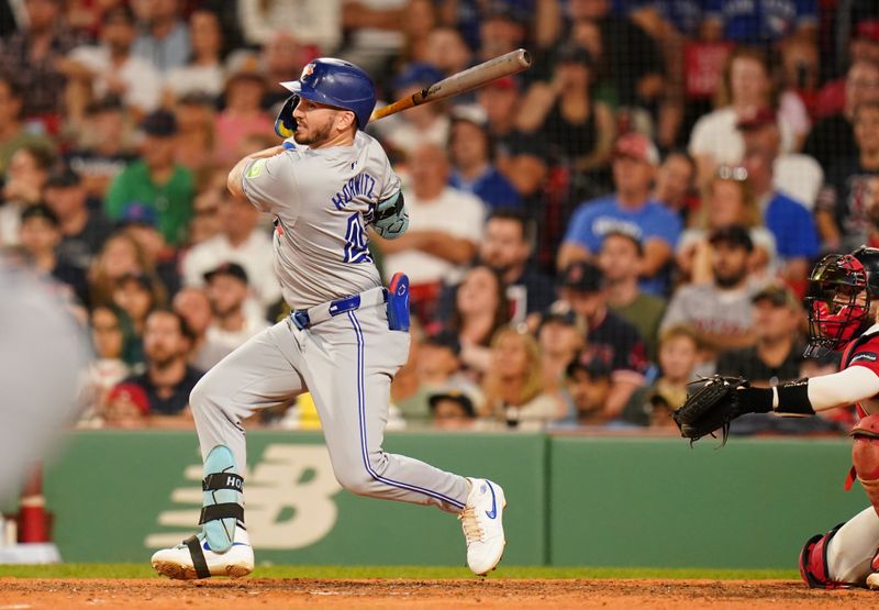 Aug 26, 2024; Boston, Massachusetts, USA; Toronto Blue Jays second baseman Spencer Horwitz (48) hits a singe to left field to drive in a run against the Boston Red Sox in the ninth inning at Fenway Park. Mandatory Credit: David Butler II-USA TODAY Sports