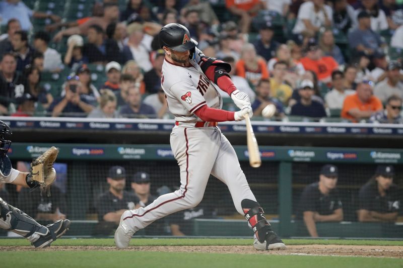 Jun 9, 2023; Detroit, Michigan, USA; Arizona Diamondbacks infielder Christian Walker (53) hits the ball during the game against the Detroit Tigers at Comerica Park. Mandatory Credit: Brian Bradshaw Sevald-USA TODAY Sports