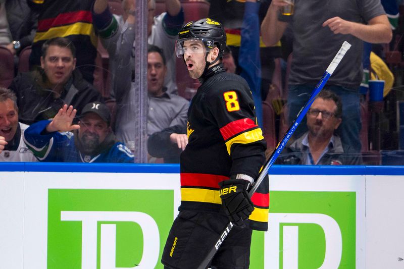 Apr 10, 2024; Vancouver, British Columbia, CAN; Vancouver Canucks forward Conor Garland (8) celebrates his goal against the Arizona Coyotes in the third period at Rogers Arena. Arizona won 4-3 in overtime. Mandatory Credit: Bob Frid-USA TODAY Sports