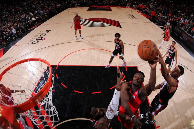 PORTLAND, OR - APRIL 9: Zion Williamson #1 of the New Orleans Pelicans drives to the basket during the game against the Portland Trail Blazers on April 9, 2024 at the Moda Center Arena in Portland, Oregon. NOTE TO USER: User expressly acknowledges and agrees that, by downloading and or using this photograph, user is consenting to the terms and conditions of the Getty Images License Agreement. Mandatory Copyright Notice: Copyright 2024 NBAE (Photo by Cameron Browne/NBAE via Getty Images)