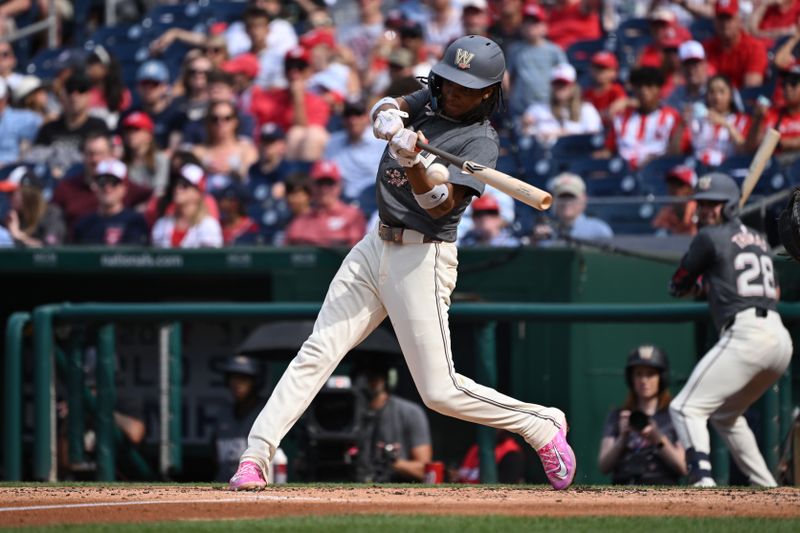 Jun 8, 2024; Washington, District of Columbia, USA; Washington Nationals shortstop CJ Abrams (5) hits a run scoring single against the Atlanta Braves during the second inning at Nationals Park. Mandatory Credit: Rafael Suanes-USA TODAY Sports