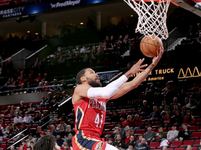 PORTLAND, OR - MARCH 27:  Garrett Temple #41 of the New Orleans Pelicans goes to the basket against the Portland Trail Blazers on March 27, 2023 at the Moda Center Arena in Portland, Oregon. NOTE TO USER: User expressly acknowledges and agrees that, by downloading and or using this photograph, user is consenting to the terms and conditions of the Getty Images License Agreement. Mandatory Copyright Notice: Copyright 2023 NBAE (Photo by Cameron Browne/NBAE via Getty Images)